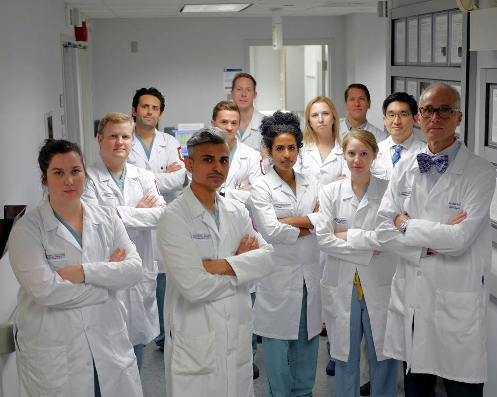 group of dentist standing and looking at the camera