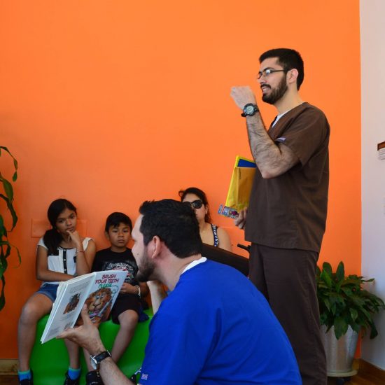 Man reading to children