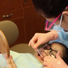 patient working in child's mouth