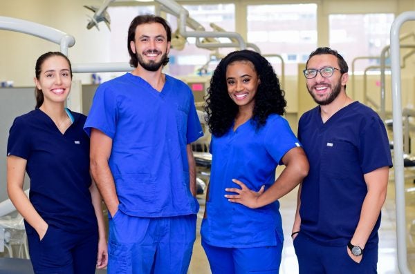 group of students in blue scrubs