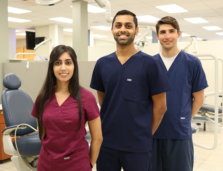 student dentists taking group photo