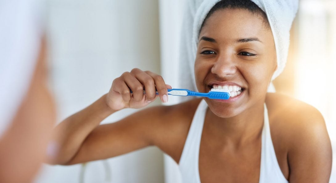 flossing and brushing teeth