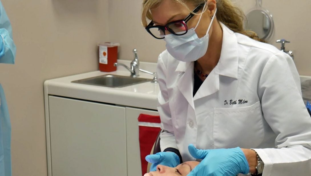 woman working with patient