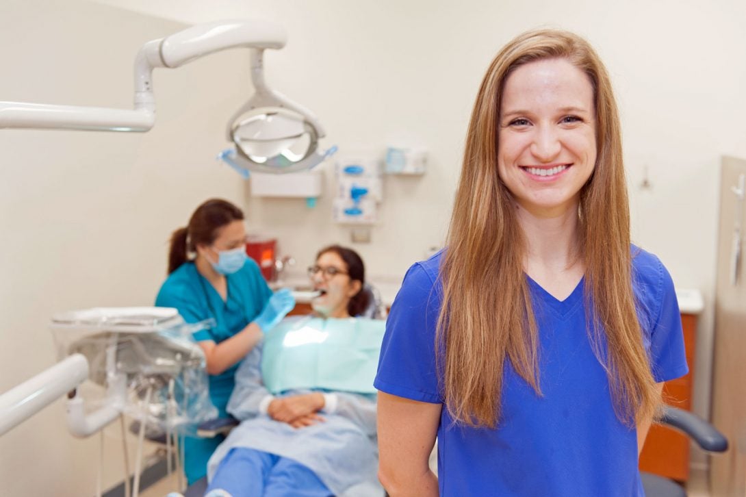 dentist talking to patient