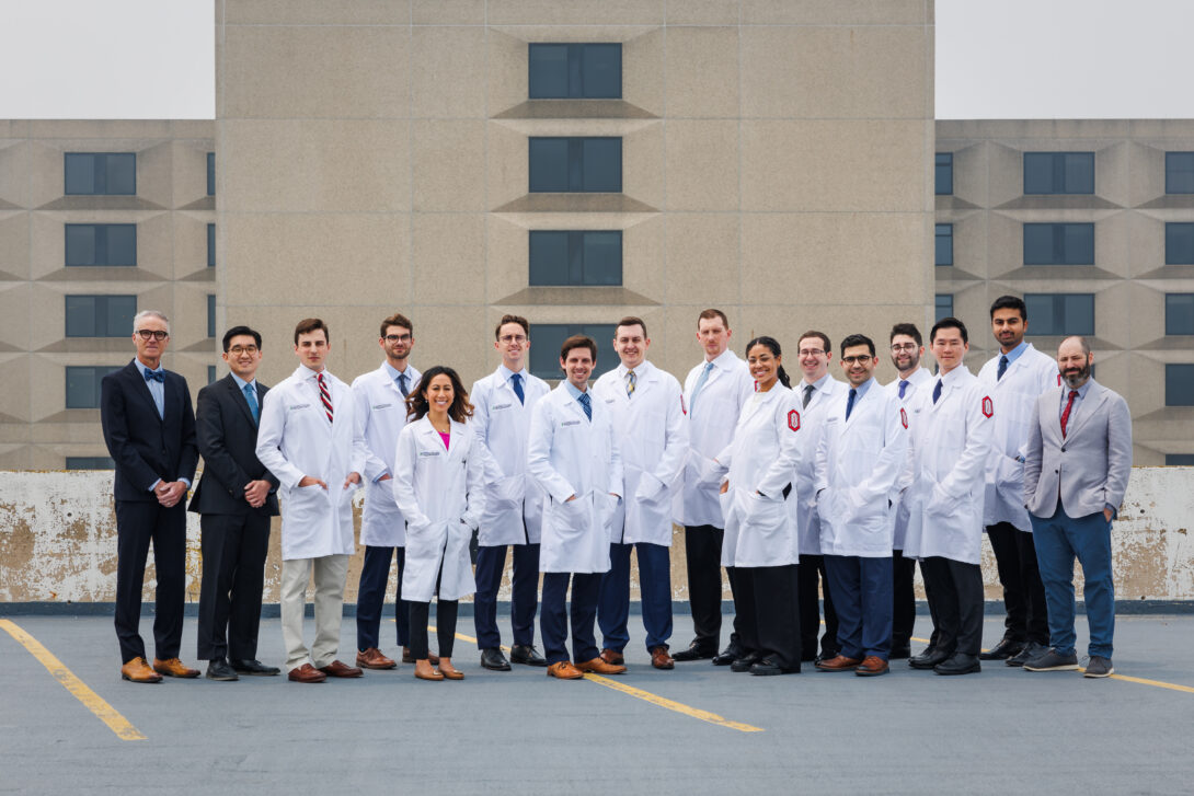 omfs group photo of everyone in lab coat