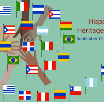 Hands holding various Hispanic flags
                  