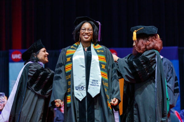 Grad with UHP stoles at commencement