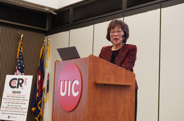 Dr. Christine Wu at the UIC podium