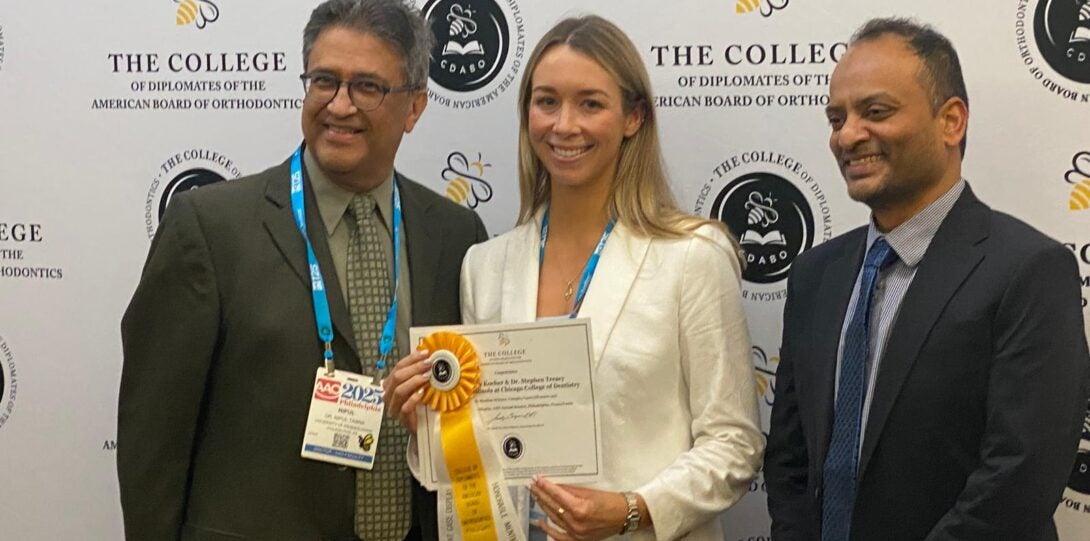Dr. Mallory Kocher (center), Dr. Sath Allareddy (right) at the AAO CDABO Resident Case Display Award Ceremony