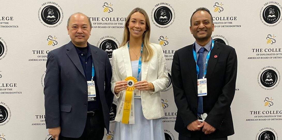 Dr. Budi Kusnoto (left), Dr. Mallory Kocher (center), Dr. Sath Allareddy (right) at the AAO CDABO Resident Case Display Award Ceremony